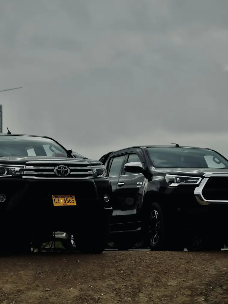 Convoy of black SUVs for a Barat